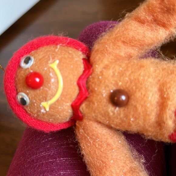 Vintage bendable smiling fuzzy gingerbread man ornament with red cap - Picture 9 of 10